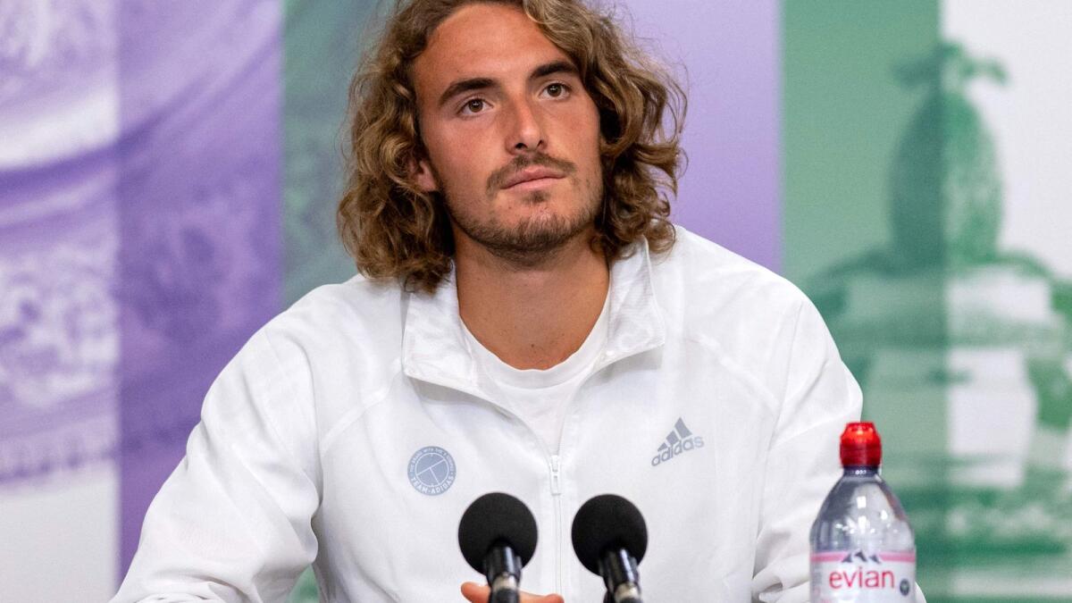 Greece's Stefanos Tsitsipas attends a video-link press conference in the Main Interview Room at The All England Tennis Club in Wimbledon. — AFP