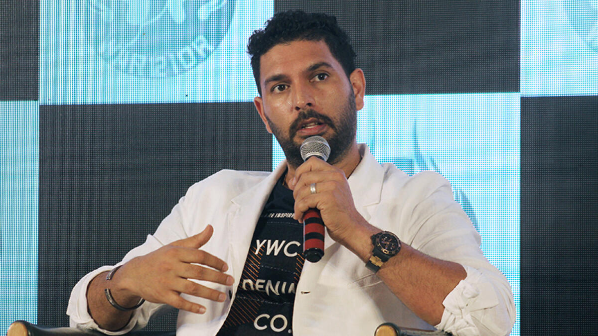 Yuvraj Singh challenged Sachin Tendulkar to break his 'record' of 100 keep-up's with a rolling pin. -- Agencies