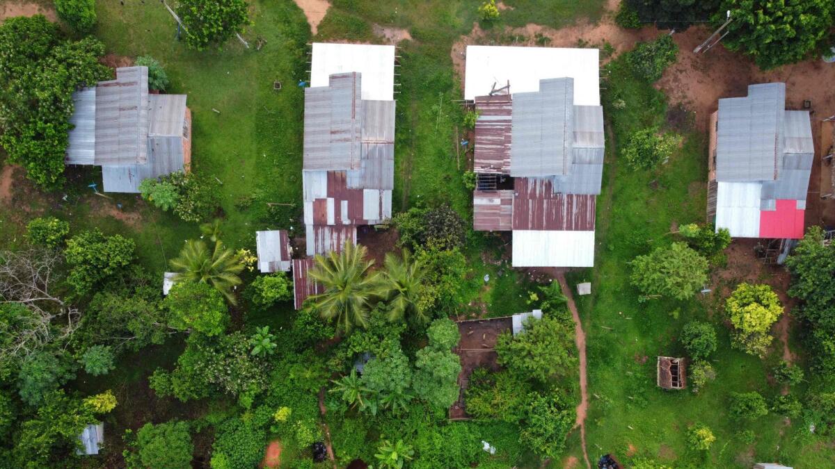 Aerial view of houses at the Amazon rainforest in Luz de America, Bolivia, taken on February 14, 2023. — AFP