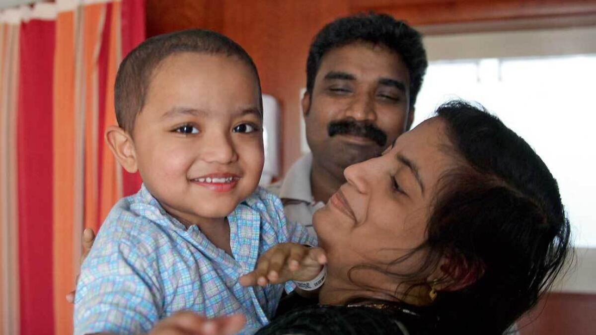 Baby Yadhav Satheesh with his mother Eliya Thomas and father Satheesh Kumar at Dubai Hospital.  — Photo by Juidin Bernarrd