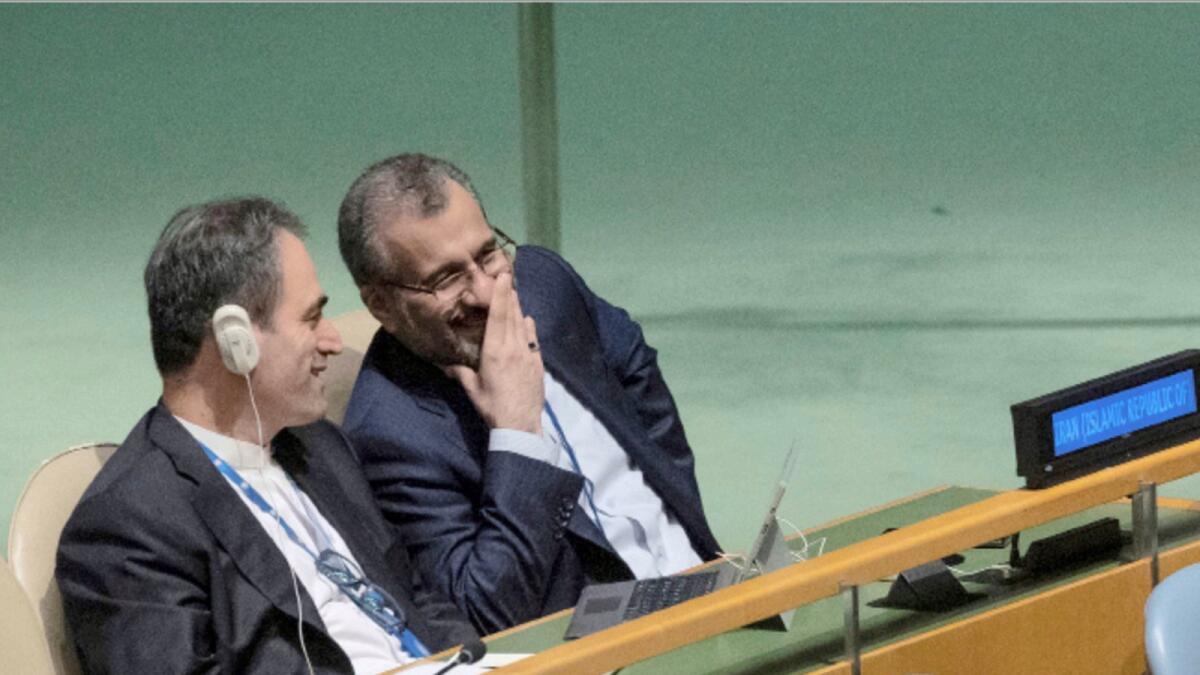 Iran's delegates look at each other while US Secretary of State Antony J. Blinken addresses the 2022 Nuclear Non-Proliferation Treaty (NPT) review conference, in the United Nations General Assembly. — AP