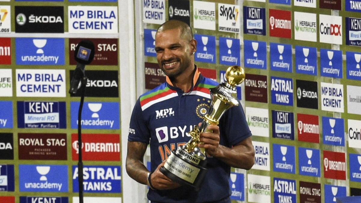Indian cricket captain Shikhar Dhawan poses with the trophy in Colombo.— AFP