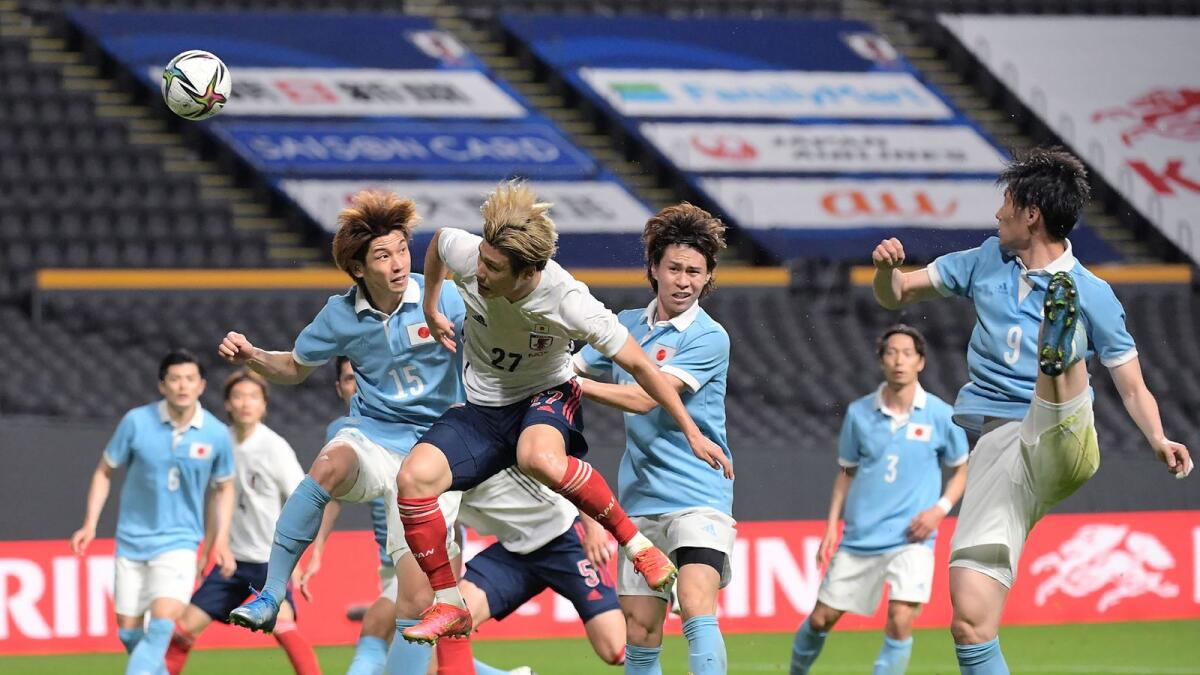 Japan's national team at a practice match in Sapporo. Photo: AFP