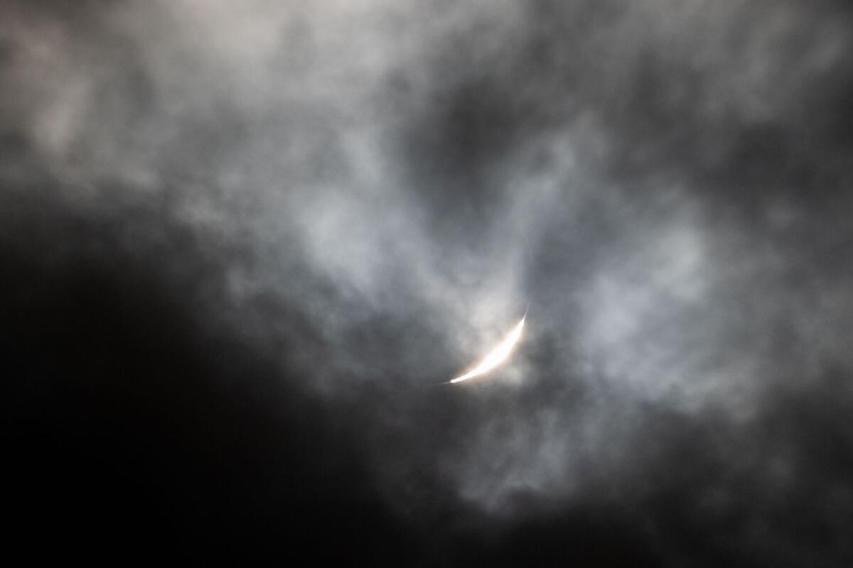 The 'Diamond Ring' is visible during the Total Solar Eclipse seen through clouds on April 8, 2024 in Niagara Falls, New York. Photo: AFP