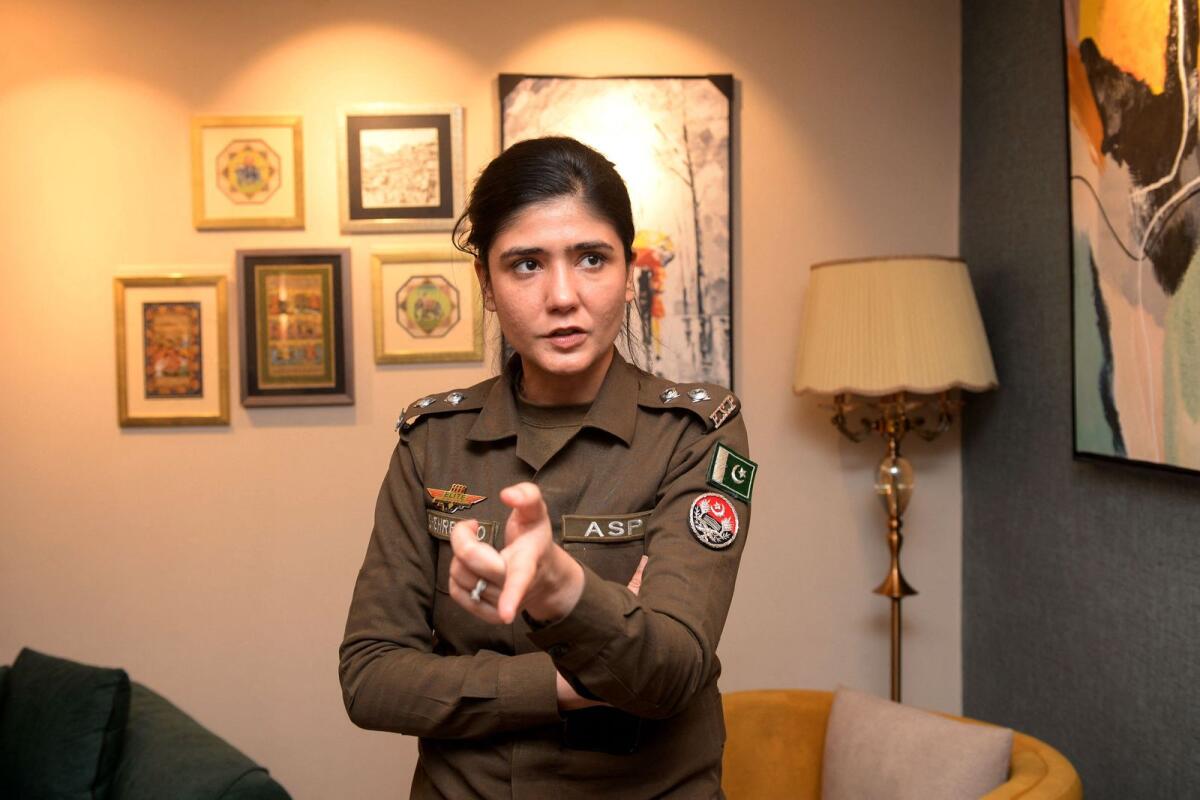 Syeda Shehrbano Naqvi, an assistant superintendent with Punjab police speaks during an interview at her office in Lahore on Tuesday. — AFP
