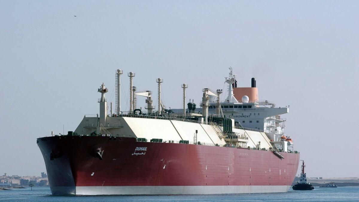 A Qatari Liquefied Natural Gas (LNG) carrier passes through the Suez Canal. — AFP file