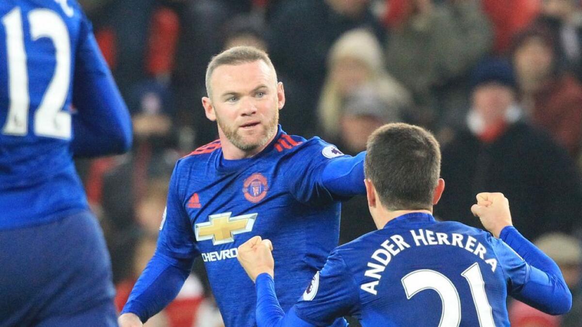 Rooneys record-breaking goal saves Man United