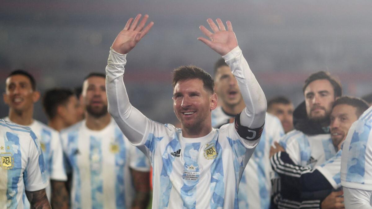 Argentina's Lionel Messi celebrates after defeating Bolivia in their World Cup qualifying match. (AFP)