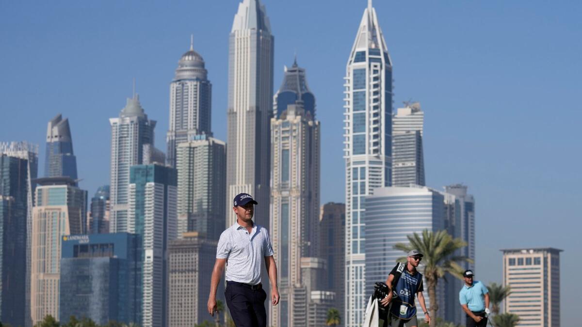 Justin Harding of South Africa walks on the 13th hole during the second round of the Dubai Desert Classic. (AP)