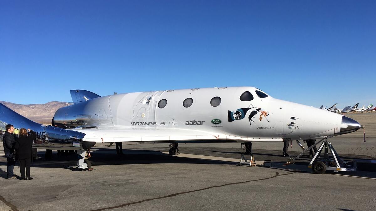Virgin Galactic’s tourism spaceship sits on the runway after climbing more than 50 miles high above California’s Mojave Desert.-AP