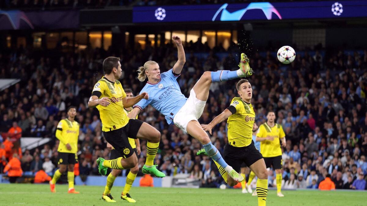 Manchester City's Erling Haaland (centre) scores their second goal. — Reuters