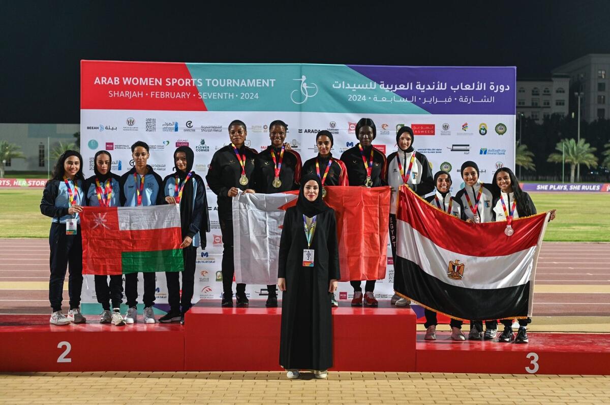 Athletes pose with their medals during the awards ceremony. — Supplied photo
