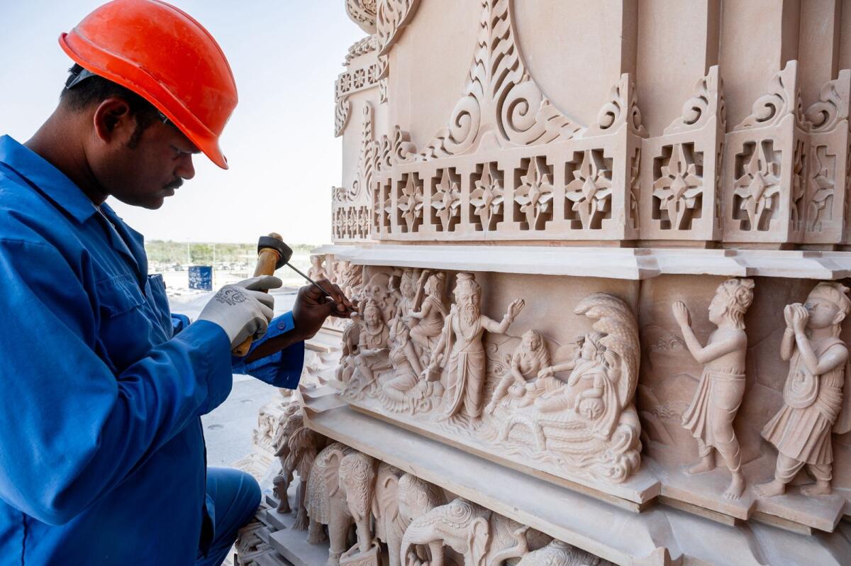 Artisans give final touches to the stone carvings that depict stories from Hindu scriptures at BAPS Hindu Mandir in Abu Dhabi. Photo: Neeraj Murali