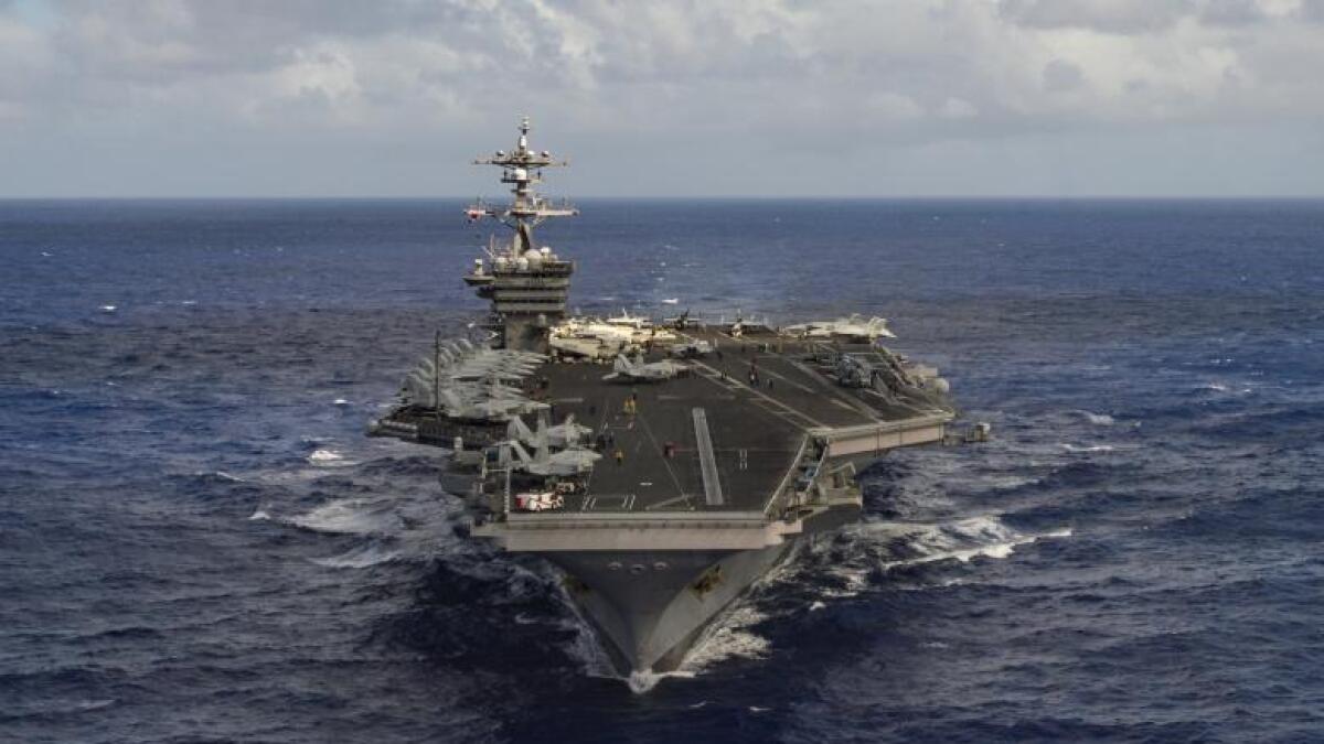 US strike group heads for Korean waters,  China calls for restraint