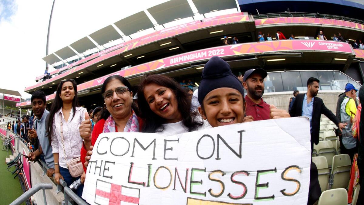 Indian fans with a sign in support of the England women's football team. — Reuters