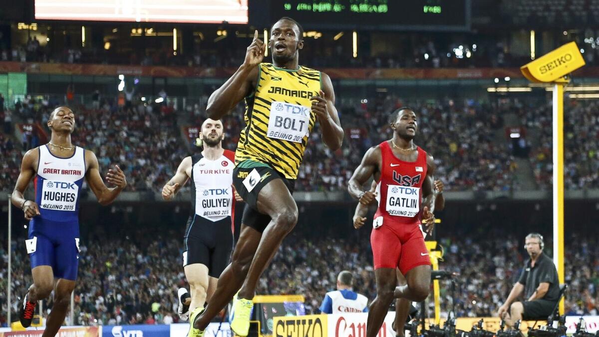  Bolt records the fastest time of the year to win fourth straight 200m title