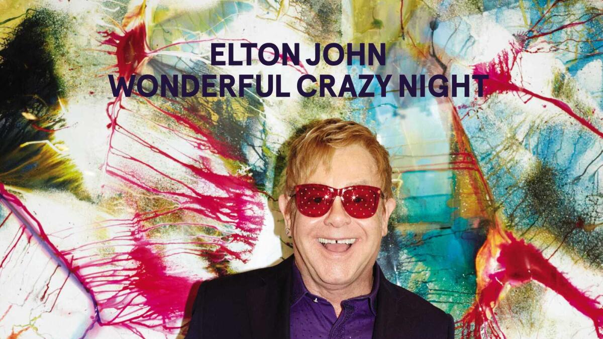 Elton John is a happy man