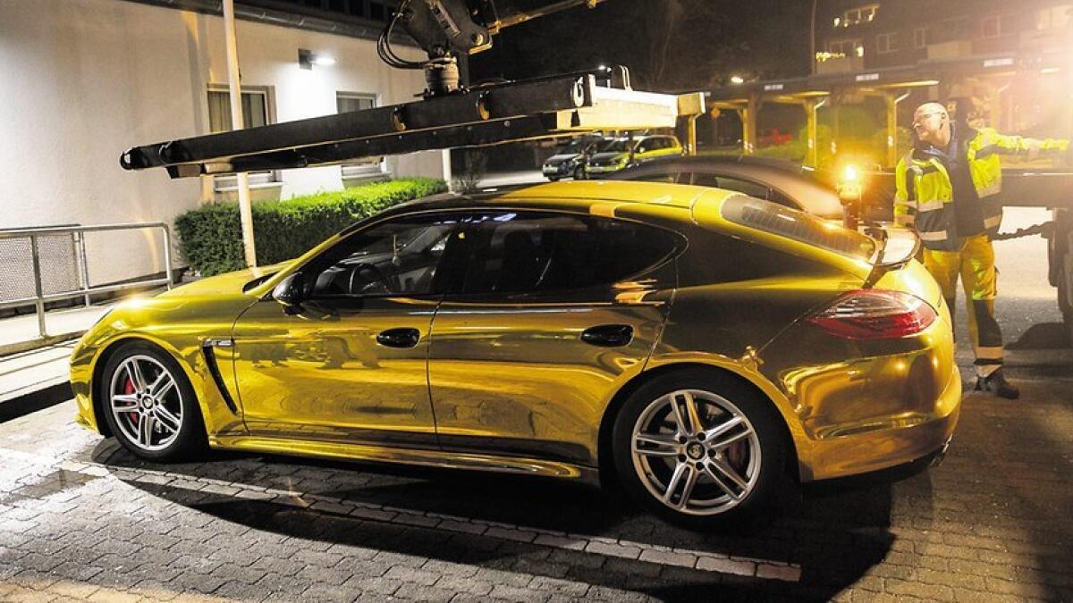 Motorist fined for driving shiny, gold Porsche