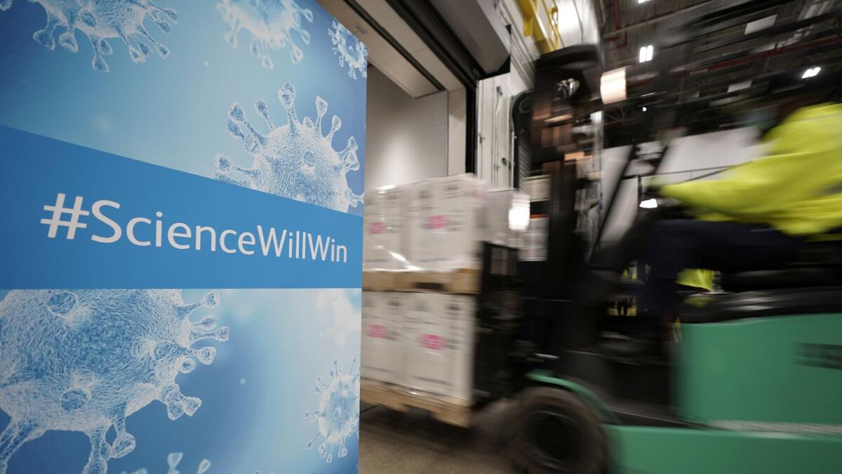 Boxes containing the Pfizer-BioNTech Covid-19 vaccine are prepared to be shipped at the Pfizer Global Supply Kalamazoo manufacturing plant in Portage, Michigan. Reuters