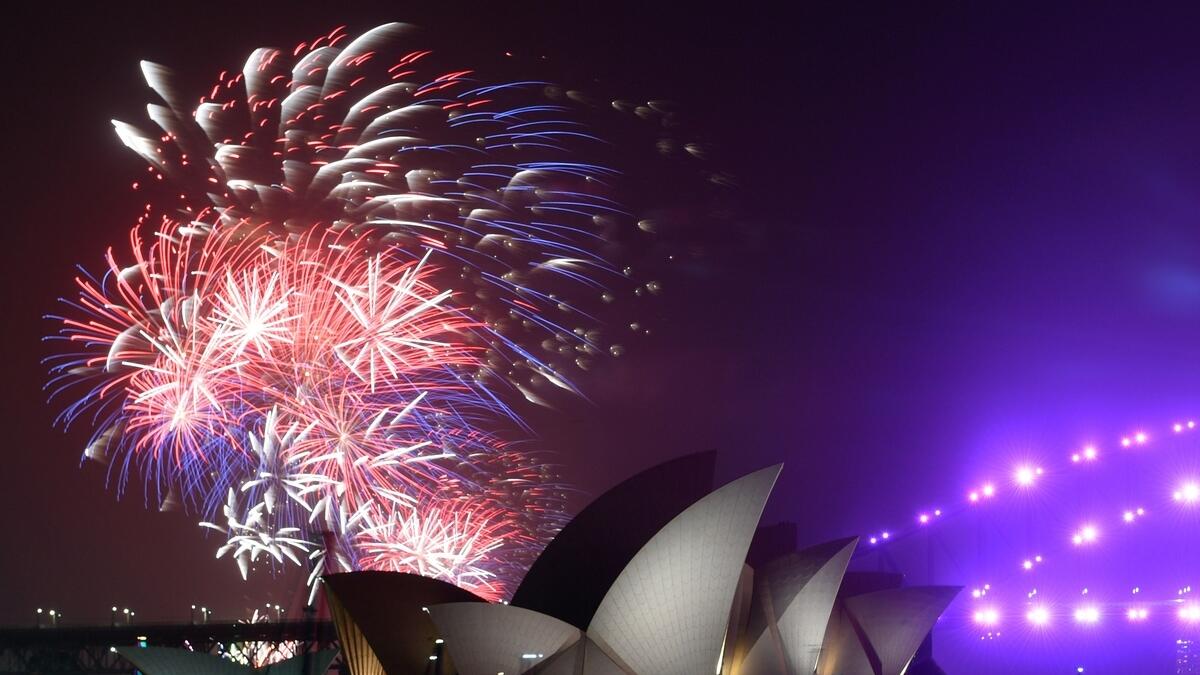 Australia’s largest city usually puts on a dazzling display of pyrotechnics over the glittering harbour to kick off global festivities, but this year’s celebrations were overshadowed by calls to cancel the fireworks as devastating bushfires raged across the country.
