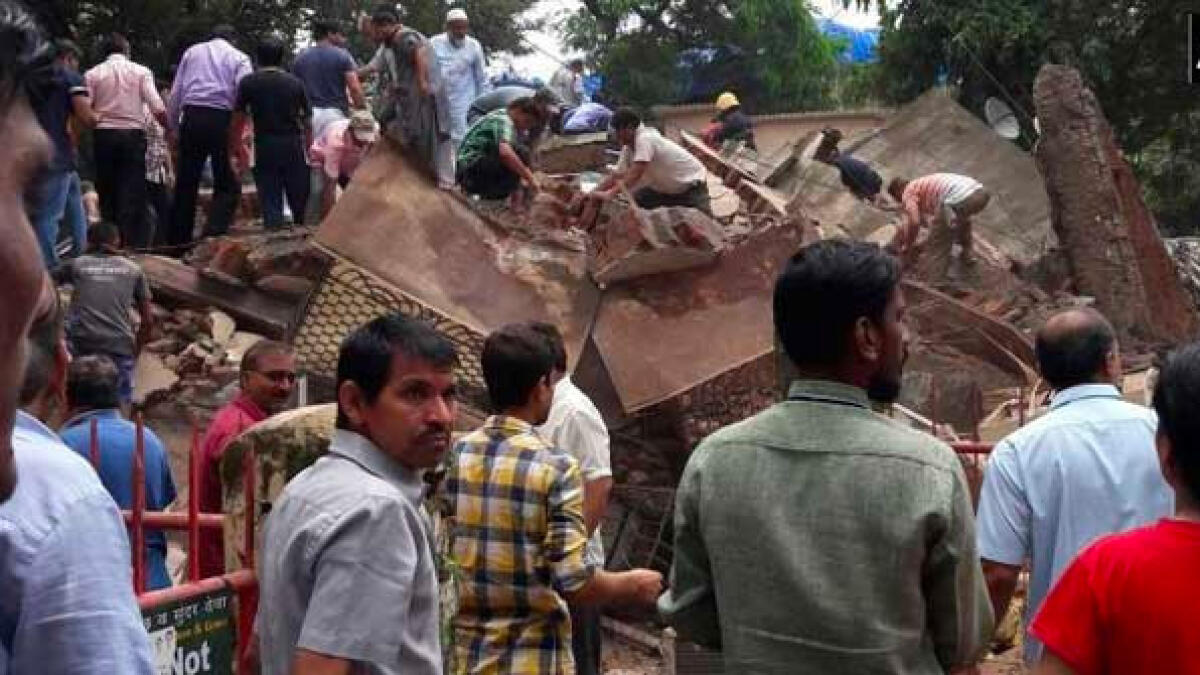 4 dead, many feared trapped In Mumbai building collapse
