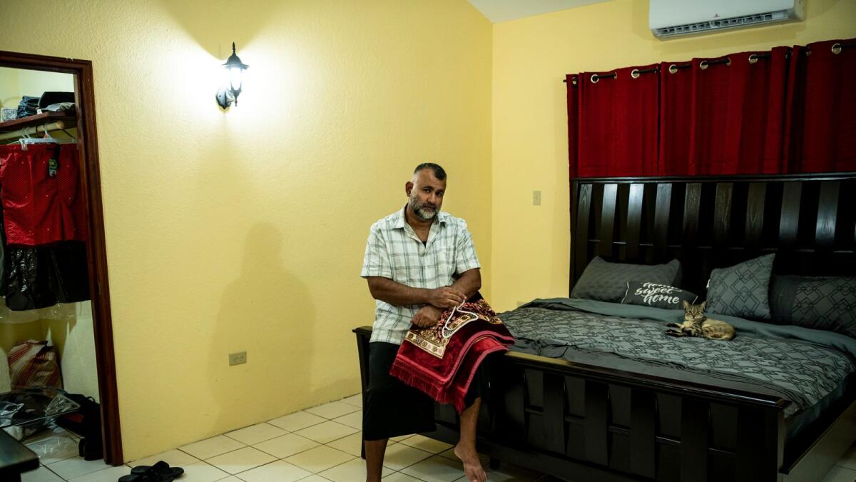 Majid Khan, who was held prisoner by the United States from March 2003, first as a suspected terrorist and later as a government cooperator, at his new home in Belize City, Belize, where hopes to start a new life, on Feb. 3, 2023. Khan, 42, is the first prisoner freed from Guantánamo Bay who was once subjected to a secret torture program for “high-value detainees.” (Meridith Kohut/The New York Times)