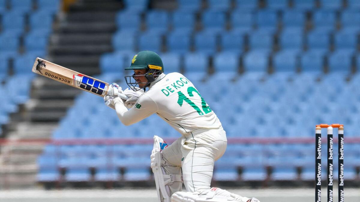 Quinton de Kock of South Africa hits a boundary during day 2 of the 2nd Test against West Indies. — AFP