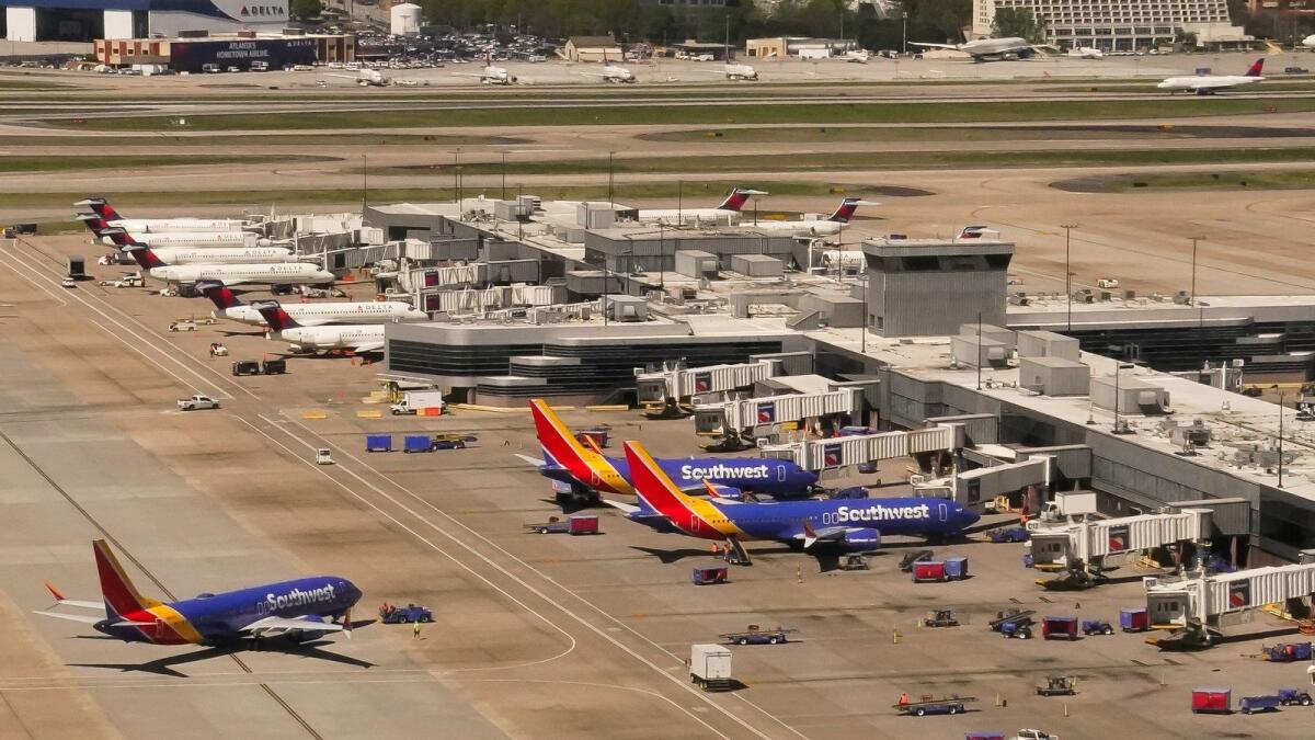 Delta and Southwest commercial airliners are seen at Hartsfield-Jackson Atlanta International Airport. — Reuters