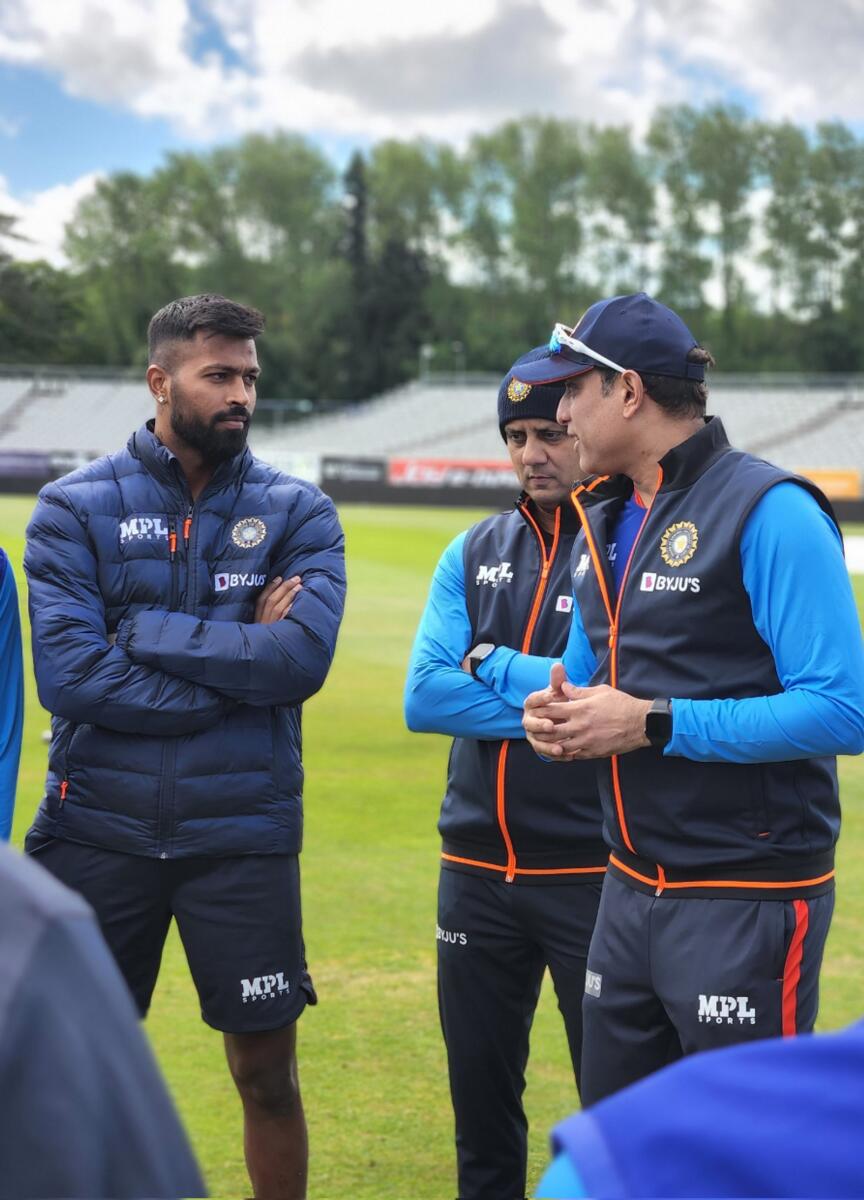 Stand-in captain Hardik Pandya (left) listens to stand-in coach VVS Laxman (right). — BCCI