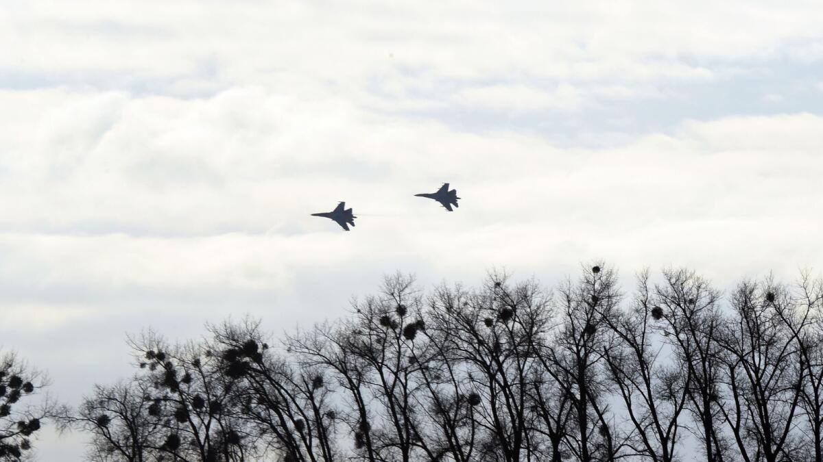 Ukrainian SU-27 planes fly over Ozerne air base, Zhytomyr region on December 6, 2018 during a dispatching ceremony of the troops to the east of the country. Photo: AFP