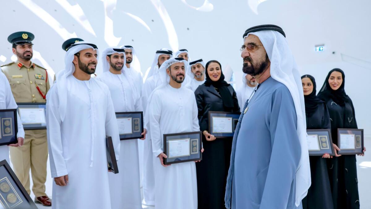 Sheikh Mohammed with the graduates of the ‘Impactful Leaders’ programme. — Wam