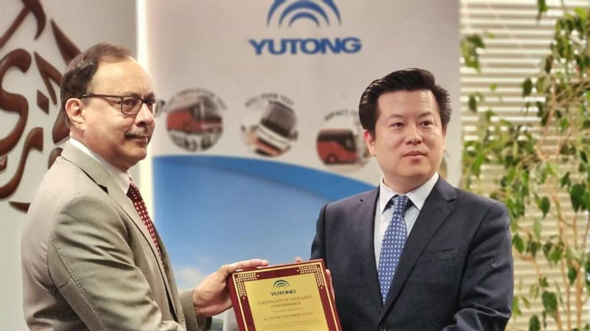 Kent Chang, director of Yutong Overseas Distribution Sales, presented the award to Hafiz Vakil, senior general manager of Al Khoory Automobiles. — Supplied photo