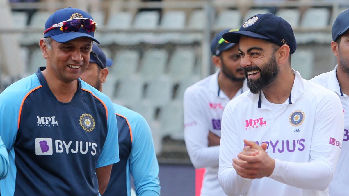 Indian skipper Virat Kohli shares a light moment with head coach Rahul Dravid during the post-match presentation ceremony. (ANI)