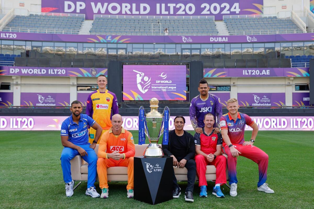 Nicholas Pooran (left), Chris Lynn, Sunil Narine, Colin Munro, Sam Billings and ILT20 brand ambassador Shoaib Akhtar pose with the trophy at the Dubai International Cricket Stadium. — Supplied photo