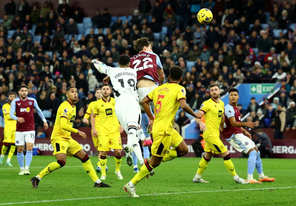 Aston Villa's Nicolo Zaniolo scores the first goal. Reuters