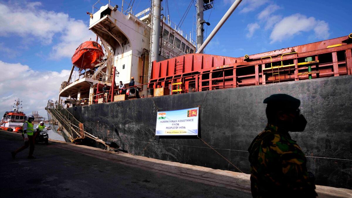 A ship that carried emergency supplies from India  to Sri Lanka docked at a port in Colombo. AP