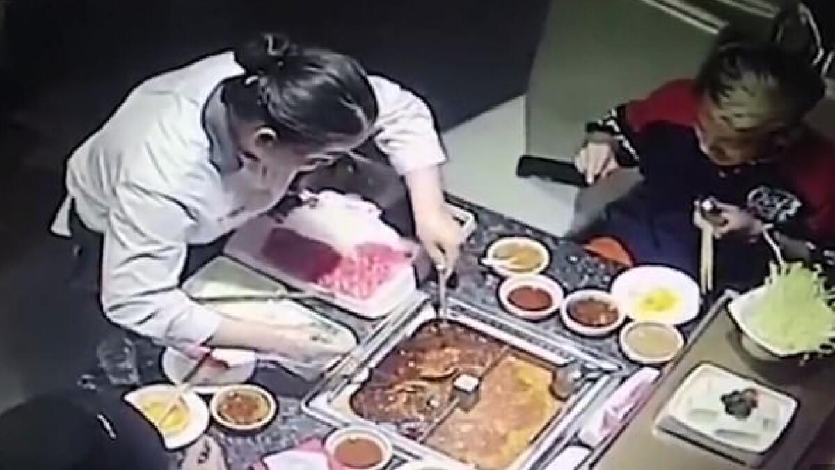 Video: Boiling soup explodes in waitresss face 