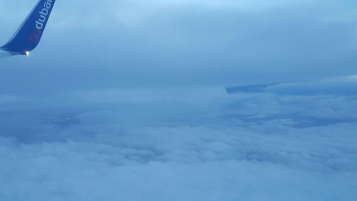 Heavy build-up of clouds over UAE skies, as seen from a FlyDubai flight to Karachi. Photo: Yousuf Saifuddin Kapadia/Khaleej Times