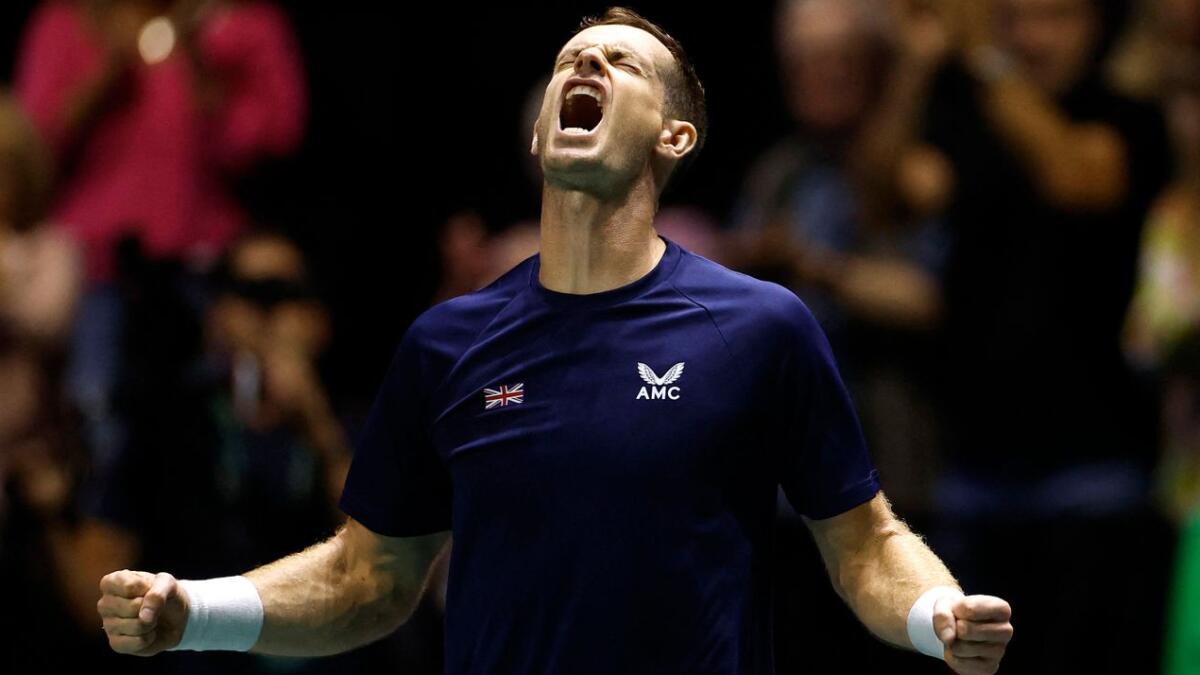 Britain's Andy Murray celebrates winning his match against Switzerland's Leandro Riedi  - Reuters