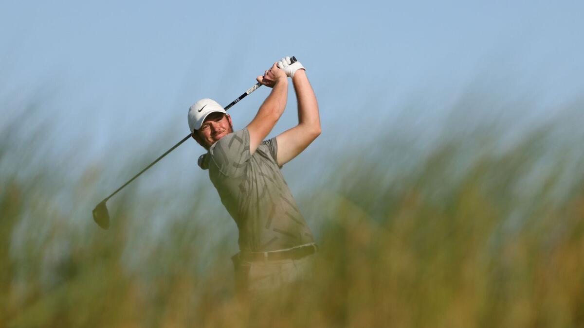 Sam Horsfield of England plays his shot from the ninth tee during the first round of the PGA Championship at Kiawah Island Resort's Ocean Course on Thursday. (AFP)
