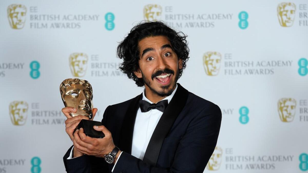 Dev Patel holds the award for best Supporting Actor, 'Lion' at the BAFTA at the Royal Albert Hall in London. Reuters