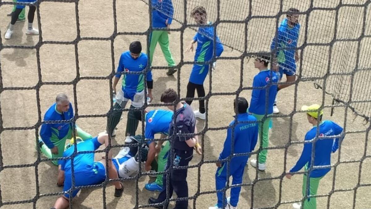 Shan Masood being attended to by teammates. — Twitter