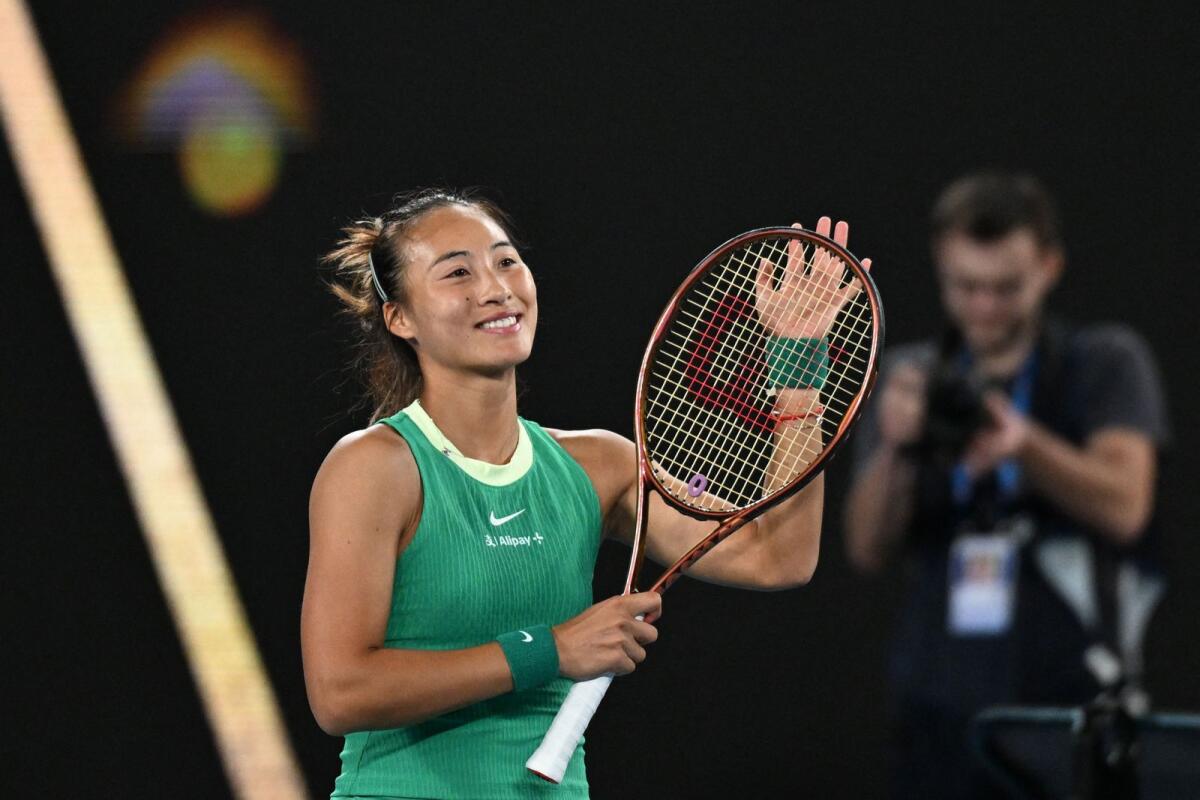 China's Zheng Qinwen celebrates her victory against France''s Oceane Dodin. — AFP