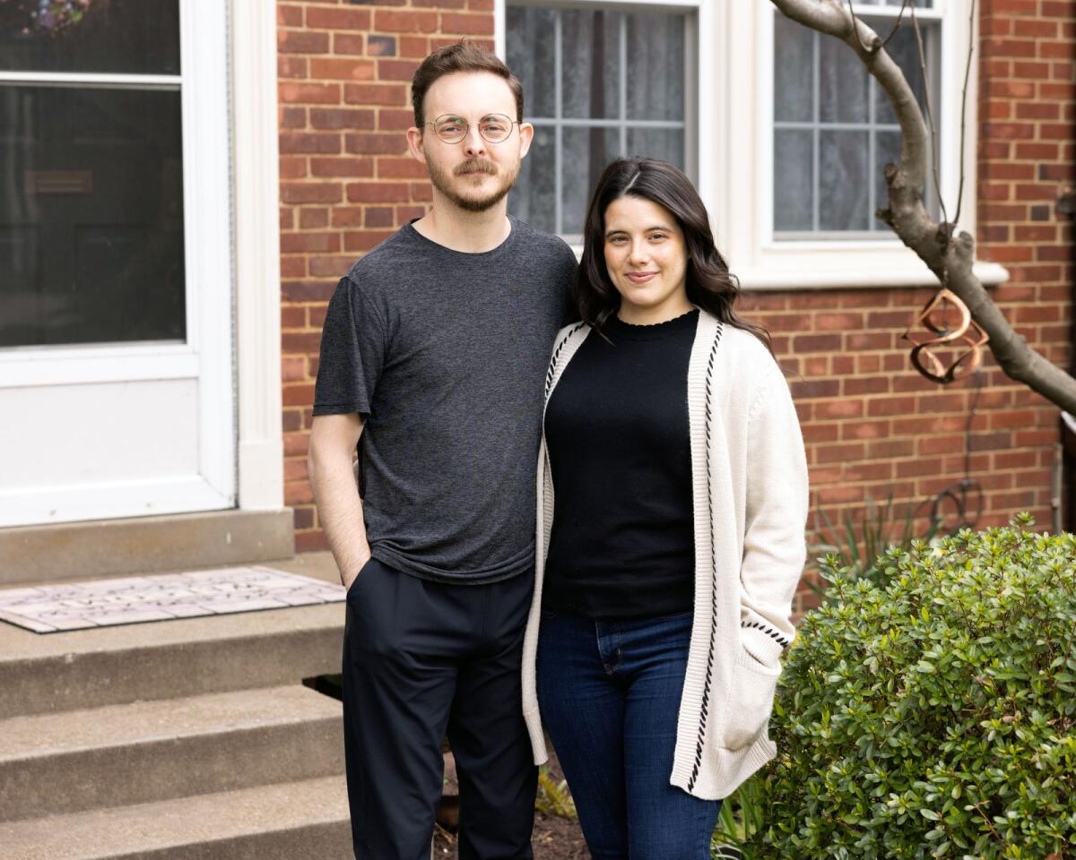 Nick and Ariel Brengle outside their rented home in Arlington, Varginia, on March 31, 2023. The cost of owning has become so high in many areas of the country that it is especially hard for first-time home buyers, who have no equity from another home to put toward a down payment — while simultaneously saving for retirement. (Tom Sandner/The New York Times)