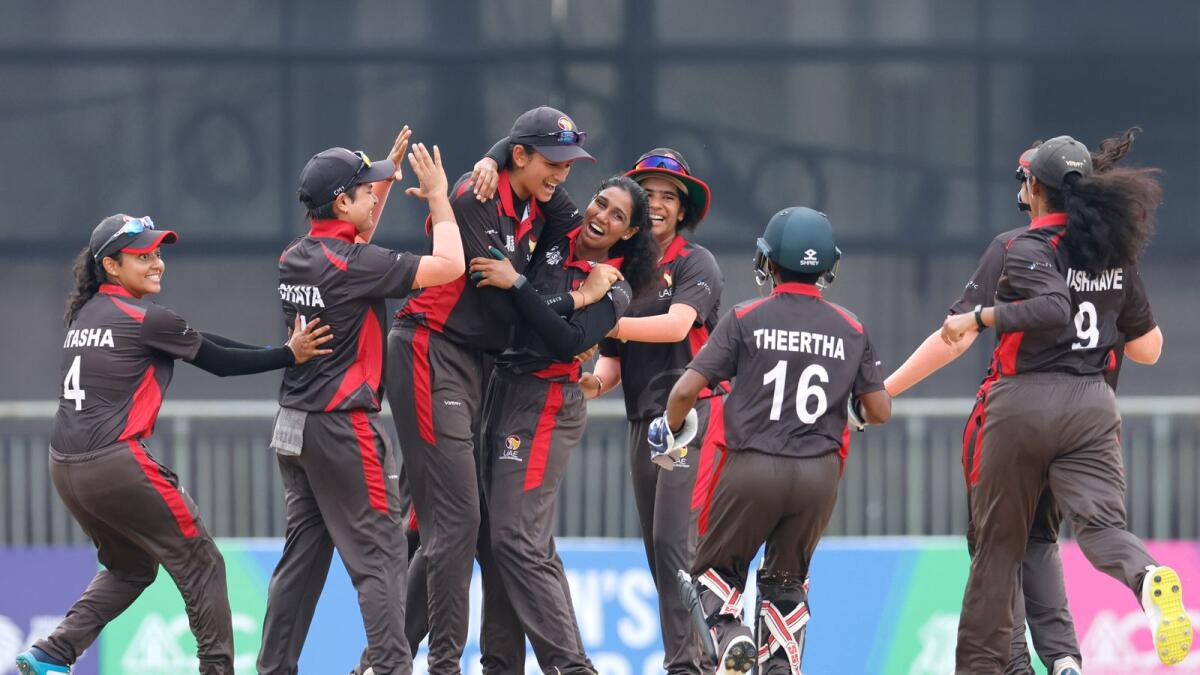 The UAE players celebrate a wicket during the Asia Cup match against Sri Lanka. (Asian Cricket Council)