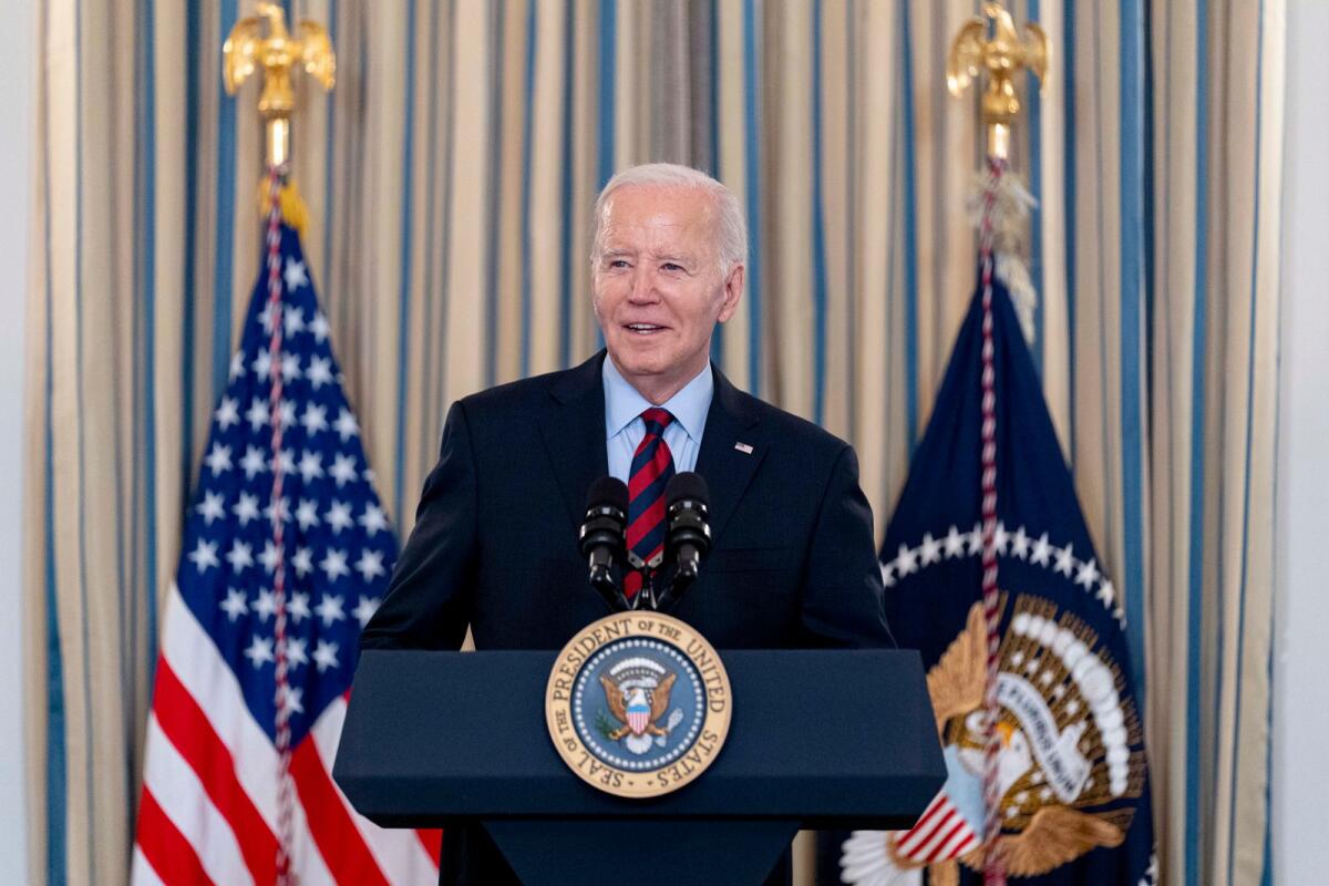 President Joe Biden speaks during a meeting of his Competition Council to announce new actions to lower costs for families in the State Dining Room of the White House in Washington, on Tuesday. — AP