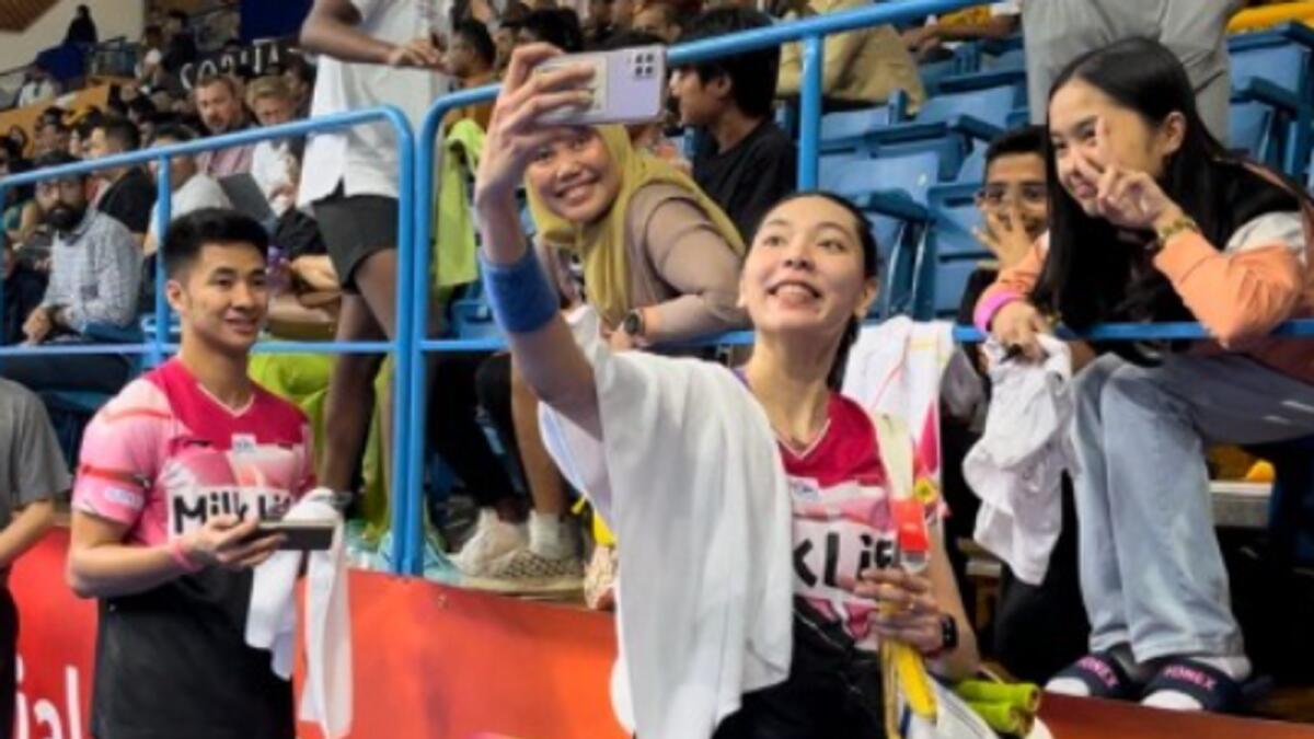 Gloria Emanuelle Widjaja takes a selfie with Indonesian fans. — Supplied photo