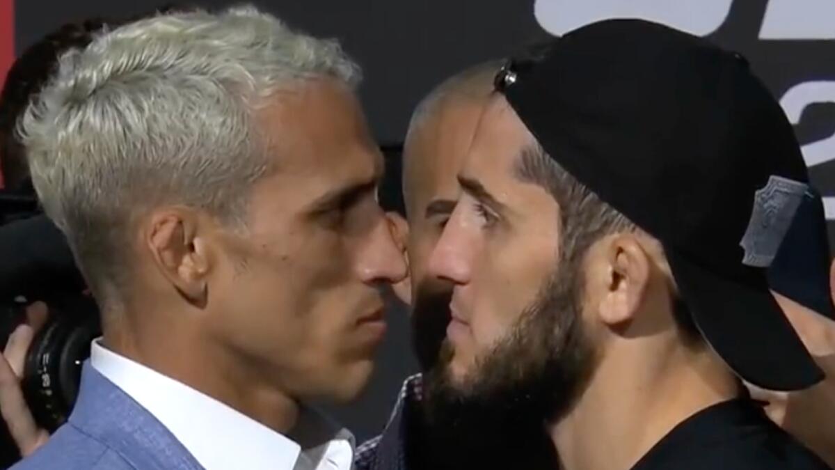 Charles Oliveira (left) and Islam Makhachev. — UFC Screengrab
