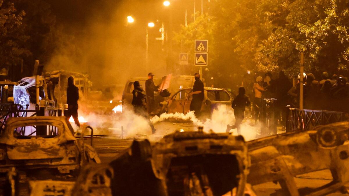 Protesters clash with police, following the death of Nahel, a 17-year-old teenager killed by a French police officer during a traffic stop, in Nanterre, Paris suburb, France, June 30, 2023. Photo: Reuters