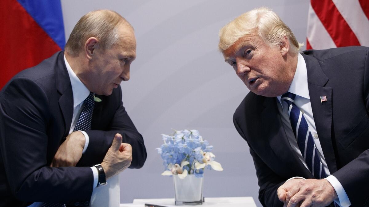After no end of drama, Trump and Putin take to summit stage 